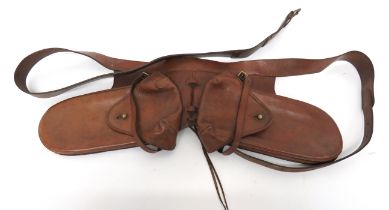 Pair Of Victorian Cavalry Saddle Wallets brown leather saddle wallets.  Top flaps secured by brass