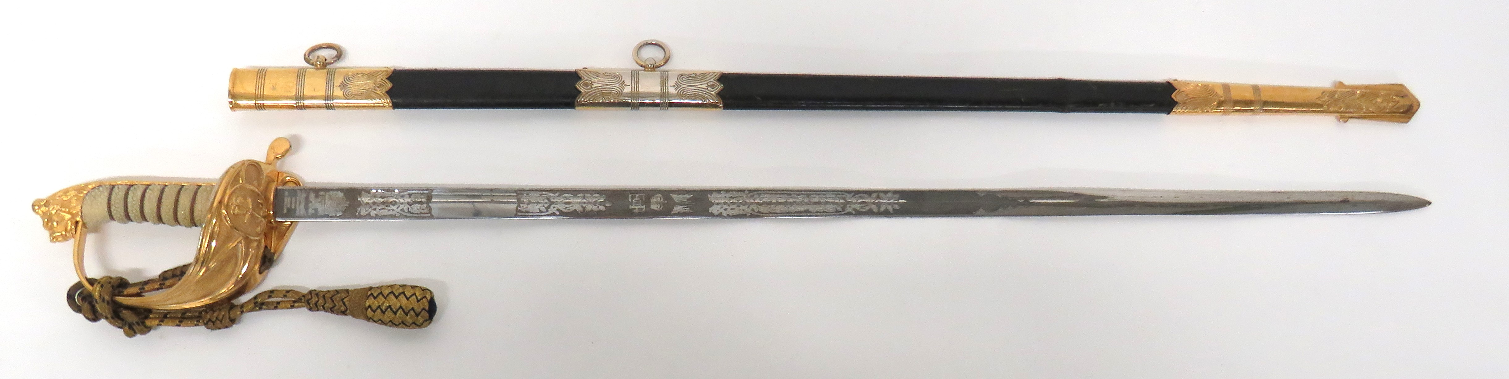 Elizabeth II Royal Navy Officer's Sword By Wilkinson 30 3/4 inch, single edged blade with fuller.