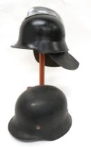 WW2 Pattern German Fire Department Helmet black painted body with chrome comb.  Rear leather