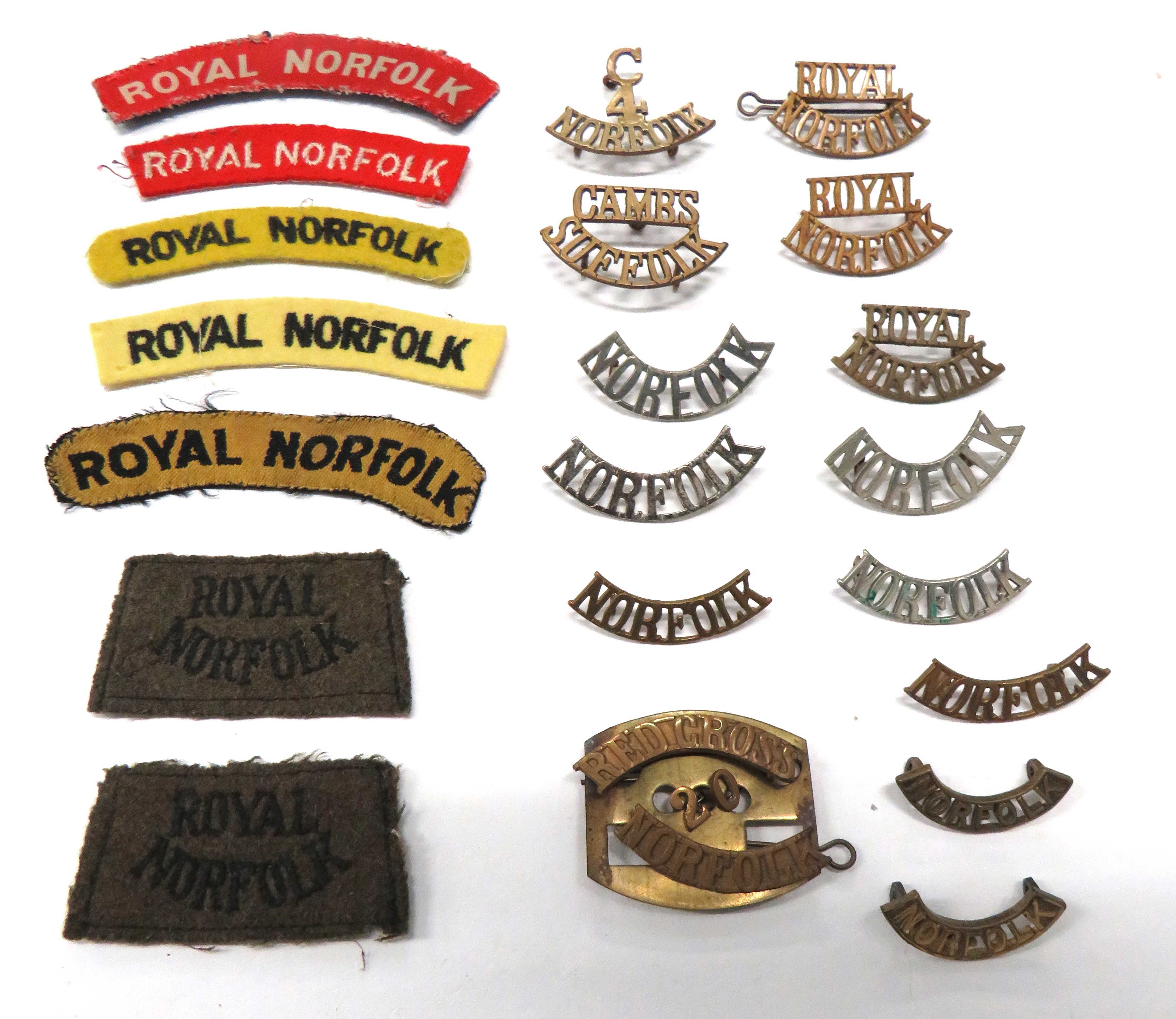 21 x Norfolk Shoulder Titles brass titles include C.4. Norfolk ... Norfolk ... Royal Norfolk ...