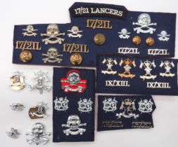 34 x Lancers Cap, Collar And Shoulder Titles cap badges include anodised QC 16th Queens
