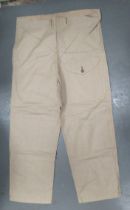 WW2 Dated Khaki Over Trousers light khaki tan, cotton, wide leg, over trousers.  Front of left leg