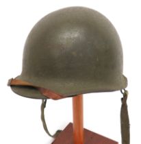 American WW2 Pattern Steel Helmet And Liner green painted, rough texture, outer shell.  Lower brim