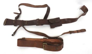 2 x Officer Sam Browne Belts consisting brown leather belts with brass buckles and fittings.  Both