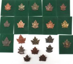 20 x Canadian WW1 Overseas Battalion Cap Badges darkened maple leaf example badges include KC 101
