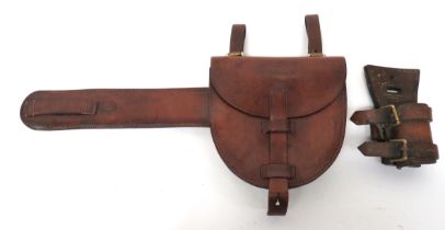 Cavalry Horseshoe Case And Separate Sword Frog half, oval leather case.  The top flap secured by a