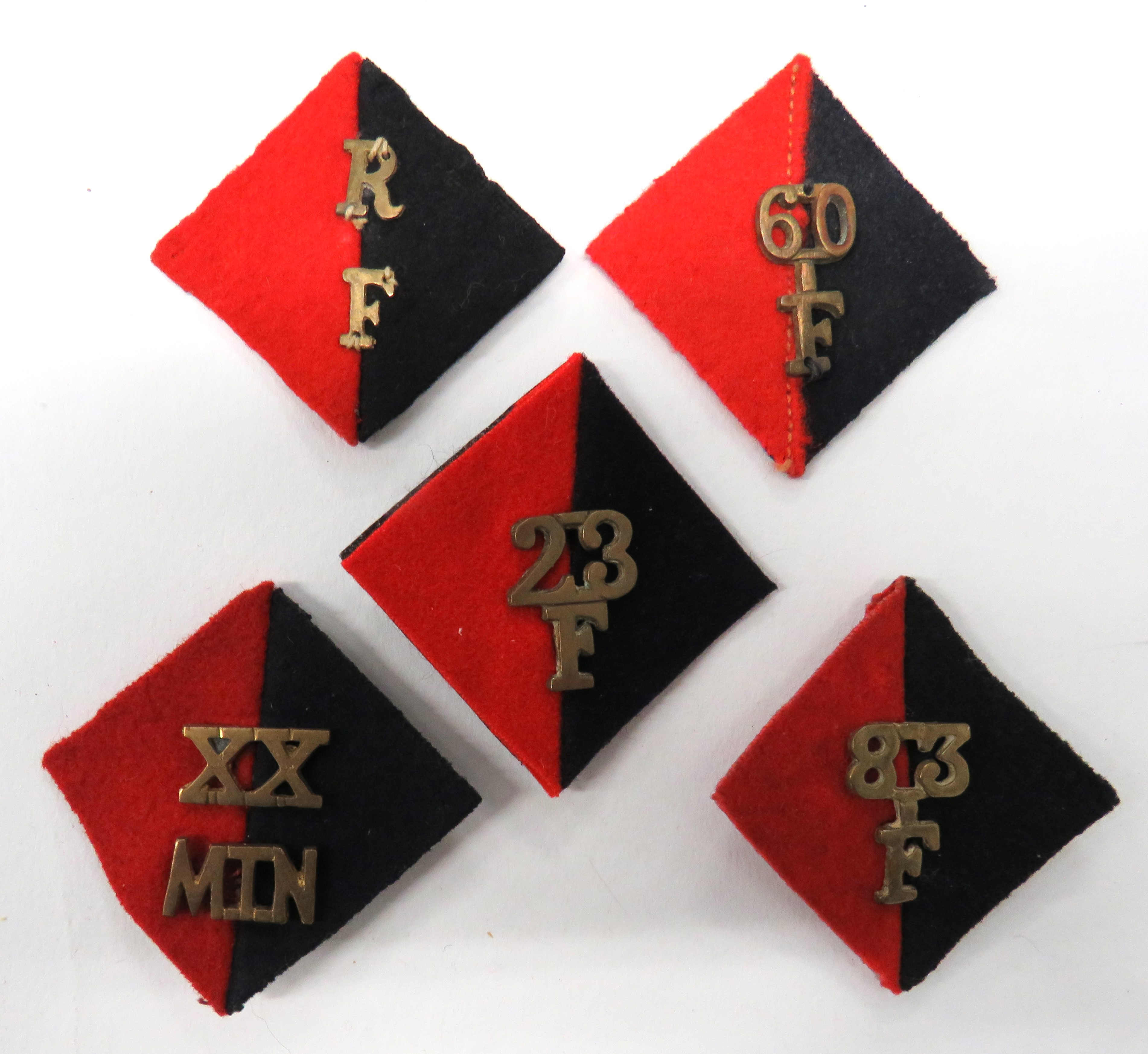 Five Royal Artillery Pagri Badges consisting red and dark blue, felt backing diamonds with