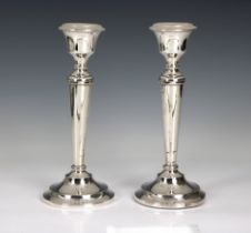 A pair of Elizabeth II weighted silver candlesticks S J Rose & Son, Birmingham, 1969, tapered body