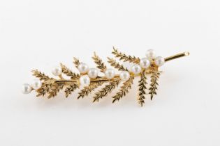 A 9ct yellow gold and pearl leaf brooch The fern leaf brooch set with pearls, approximately 5.8cm in