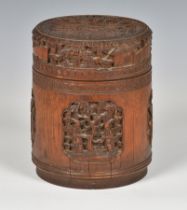 A Chinese bamboo tea caddy or tobacco box and cover probably late 19th century, of cylindrical form,