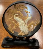 A fine Japanese carved cork diorama in circular case and stand depicting birds in a tree, 12in. (