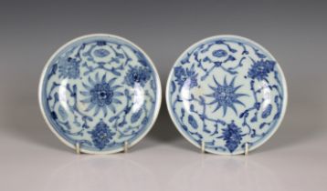 A near pair of Chinese blue & white porcelain dishes having central flower decoration, seal mark