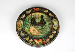 A mid to late 20th century large Russian lacquered box of circular form, the very detailed pull-