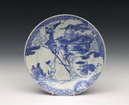 A 19th Century Chinese blue and white porcelain dish 12¼in. (31.1cm.) diameter. *Natural firing