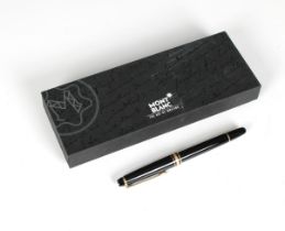 A Mont Blanc Meisterstuck Classique 163 rollerball pen in box with guide and warranty, dated 5-4-97.