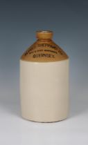 An Alfred Sheppard Ltd - Wine & Spirit Merchants Guernsey Half Gallon Flagon by Price Bristol, 10¼