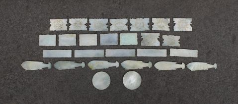 A quantity of 19th century Chinese mother-of-pearl gaming counters in a variety of forms including