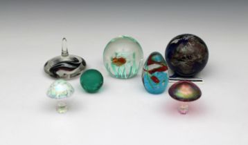 Lundberg Studios glass world paperweight dated 1995 no. 0912114 and signed to base with certificate,