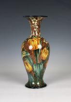 A Doulton Lambeth faience vase of ovoid form, decorated with flowers, signed 'HA' for Helen A