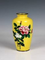 A Japanese Sato style cloisonné vase yellow ground, decorated with floral spray, white metal base