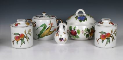 A collection of Royal Worcester Evesham pattern dinner ware to include a pair of biscuit barrels