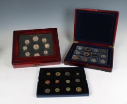 A collection of various coinage to include a cased set of Elizabeth II enamelled coins each in a