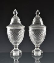 A good pair of early 19th century Voneche cut glass urn shaped jars and covers lemon squeezer