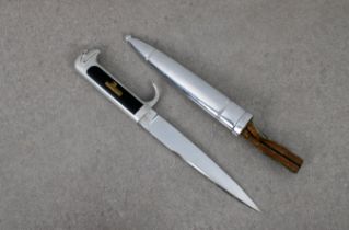 An Italian MVSN (Opera Balilla) officer's dagger aluminium hilt, equipped with inlaid black