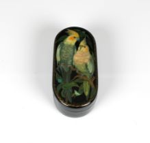 A mid to late 20th century Russian lacquer box of elongated oval form, the hinged cover depicting