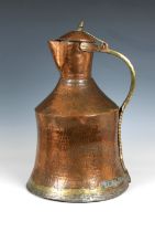 A large Islamic / Persian copper and brass water jug probably 19th century, of waisted cylindrical