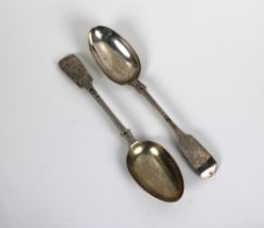 Two silver bright cut fiddle pattern table spoons one London retailer's mark "CT Maine" engraved "
