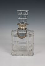 A silver mounted rectangular clear glass decanter and Georgian silver bottle ticket 9¾in. (24.