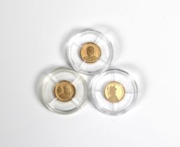 Three small Gold Proof Commemorative 11mm coins comprising a Pope Francis, gold.375; John F.