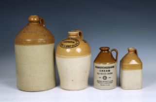 A small collection of stoneware flagons to include a W. J. Armstrong, Wine, Spirit & Beer