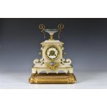 A 19th century French alabaster cased mantel clock surmounted by a squat lidless urn with gilt metal