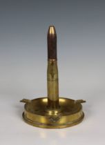 Trench Art - Ashtray with integral bullet lighter the ashtray fashioned from a shell casing,
