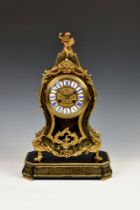 A French Boulle inlaid striking mantel clock late 19th century, the balloon shaped case with gilt