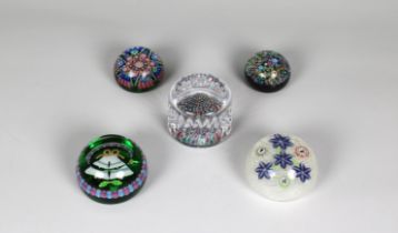 A collection of Perthshire glass paperweights to include a paperweight depicting 'forget me not'