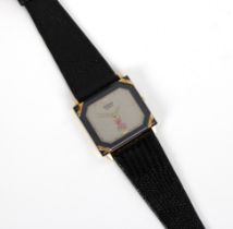 A Rado Florence gold plated and black ceramic watch bearing the logo of the Omani Olympic team on