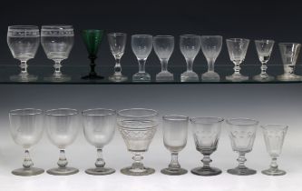 A quantity of mostly 19th century, drinking glasses including a pair of rummers with etched