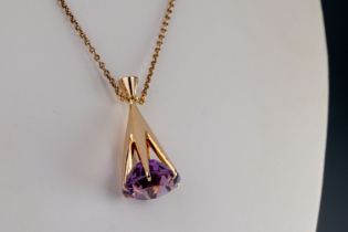 14ct yellow gold amethyst drop necklace The amethyst suspended from a six claw-set 14ct yellow