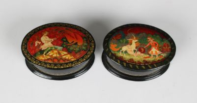 Two mid to late 20th century Russian lacquered boxes both of oval form with pull off covers, signed,