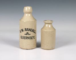 A scarce R. W. RANDALL Guernsey stoneware Ginger Beer bottle 6 7/8in. (17.5cm.) high, together