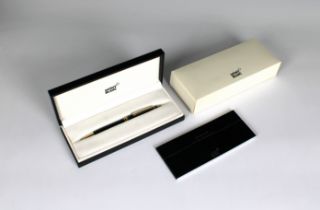 A Montblanc Meisterstück Classique black ballpoint pen with twist mechanism, black resin with gold