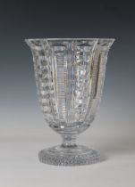 A cut glass footed vase with flared rim on a circular base geometric decoration, 12in. (30.5cm.)