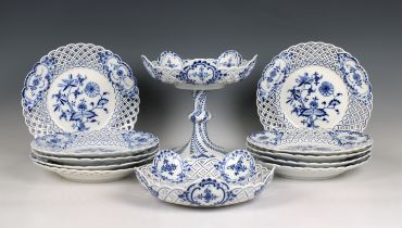 A Meissen blue and white onion pattern part dessert service with reticulated borders comprising a