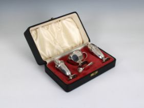 An Elizabeth II cased silver cruet set Viner's Ltd, Sheffield, 1963, of octagonal form, comprising a