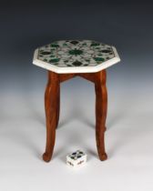 An inlaid marble pietra dura wine / side table of octagonal form, 12¾in. (32.4cm.) diameter,