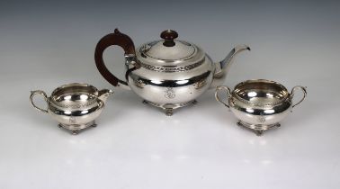 A George V silver three piece tea service Martin Hall & Co, Sheffield, 1927, of compressed spherical