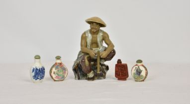 Four Chinese snuff bottles three porcelain and one cinnabar lacquer, with stoppers, all with Chinese